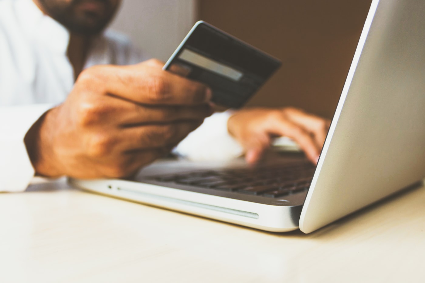 Phone, calendar, and bills organized for subscription and spending tracking